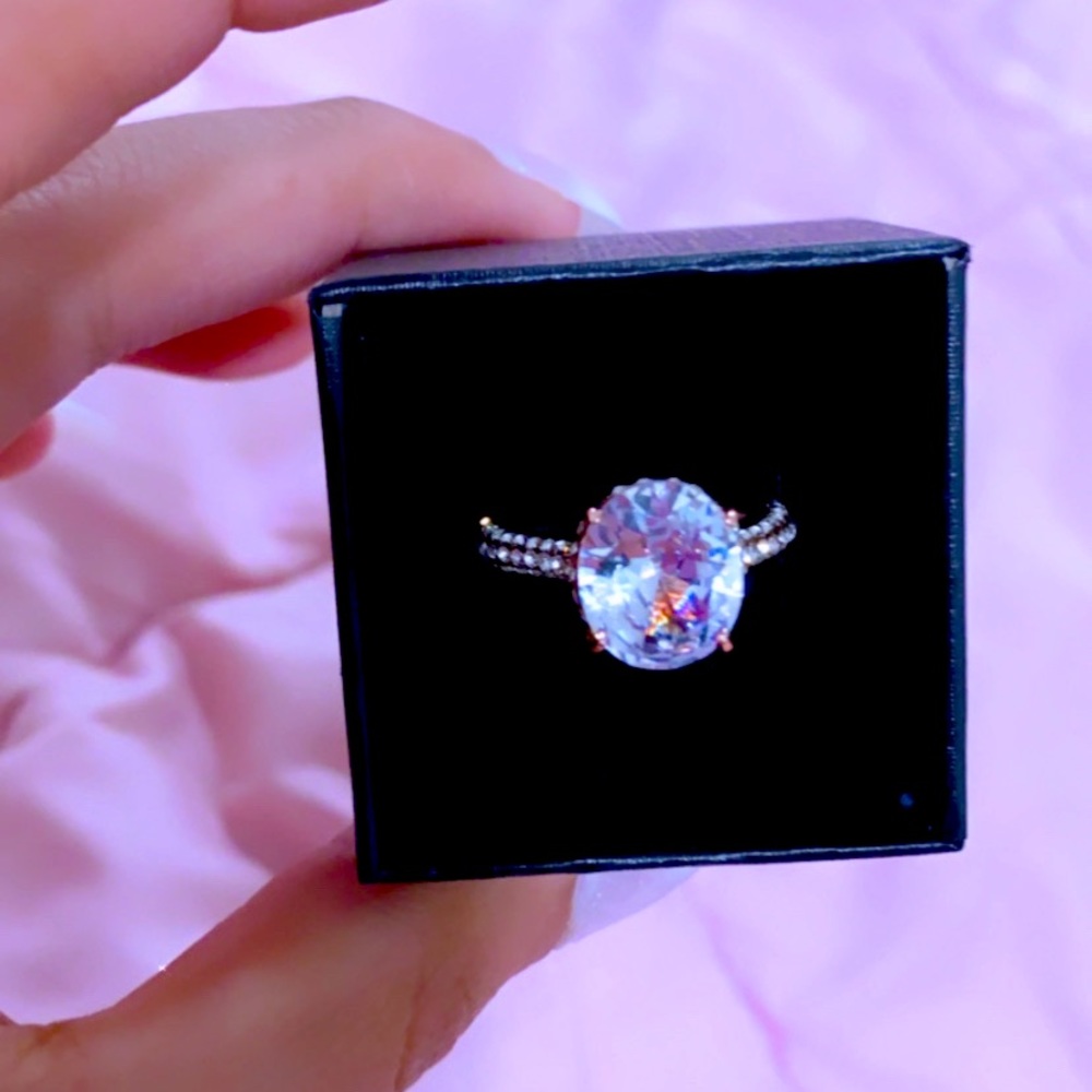 Round cut white sapphire gold plated ring